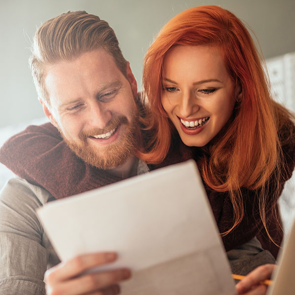 A couple of patients reviewing their statement.